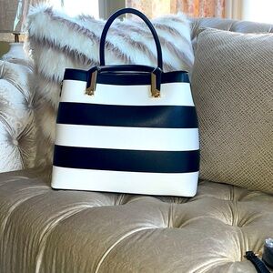 This Black & White stripes tote bag with wallet and cross body straps.